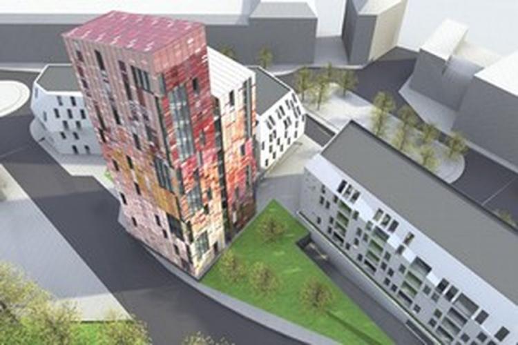 ensemble regroupant un immeuble de bureaux, un hôtel et des logements