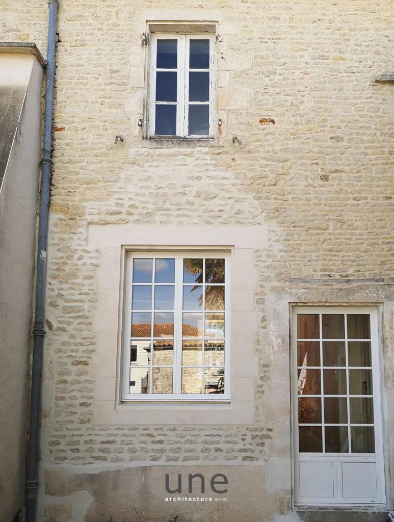 Vue de modifications partielles de façade en pierre