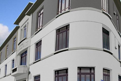 Le bâtiment réhabilité à l'angle de la rue